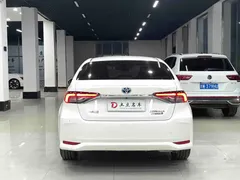 2021 Toyota Corolla Hybrid 1.8L E-CVT Elite, белый — фото 11