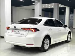 2021 Toyota Corolla Hybrid 1.8L E-CVT Elite, белый — фото 12