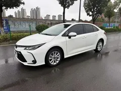 2023 Toyota Corolla 1.2T Elite, белый — фото 1