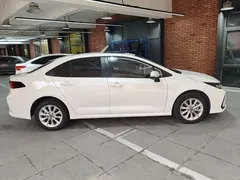 2021 Toyota Corolla 1.2T S-CVT Luxury, белый — фото 5