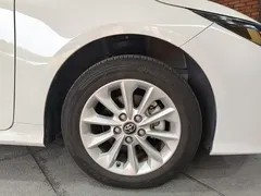 2021 Toyota Corolla 1.2T S-CVT Luxury, белый — фото 17