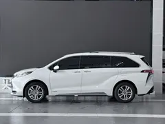 2021 Toyota Sienna 2.5L Hybrid Platinum, белый — фото 4