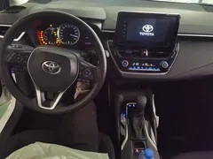 2022 Toyota Corolla 1.8L Hybrid E-CVT, белый — фото 12