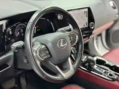 2023 Lexus NX 400h+ PHEV, белый — фото 10