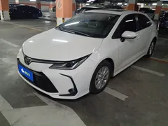 2021 Toyota Corolla TNGA 1.5L CVT Elite, белый — фото 1