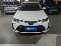 2021 Toyota Corolla TNGA 1.5L CVT Elite, белый — фото 2