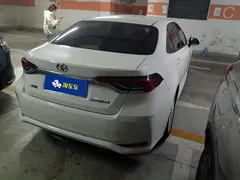 2021 Toyota Corolla TNGA 1.5L CVT Elite, белый — фото 3