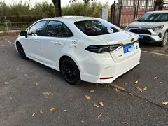 2021 Toyota Corolla TNGA 1.5L CVT GR Sport, белый — фото 10