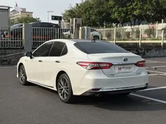 2023 Toyota Camry Hybrid 2.5HG Luxury, белый — фото 5