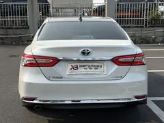 2023 Toyota Camry Hybrid 2.5HG Luxury, белый — фото 6