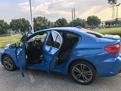 2021 BMW 1 Series 120i M Sport, синий — фото 10