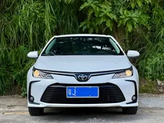 2021 Toyota Corolla 1.2T S-CVT Elite, белый — фото 2