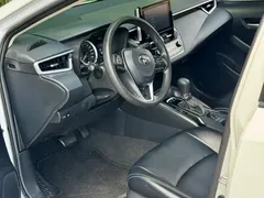 2021 Toyota Corolla 1.2T S-CVT Elite, белый — фото 7