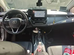 2021 Toyota Corolla TNGA 1.5L CVT Elite, белый — фото 12