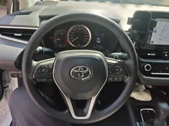 2021 Toyota Corolla TNGA 1.5L CVT Elite, белый — фото 15