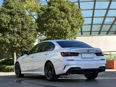 2021 BMW 3 Series 325Li M Sport Night Package, белый — фото 7