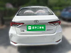 2021 Toyota Corolla TNGA 1.5L CVT Elite, белый — фото 3