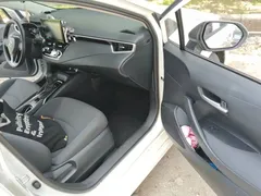 2021 Toyota Corolla TNGA 1.5L CVT Elite, белый — фото 19