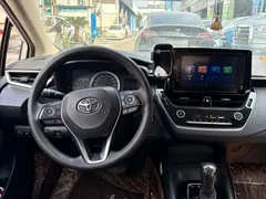 2022 Toyota Corolla 1.8L Hybrid E-CVT, белый — фото 10