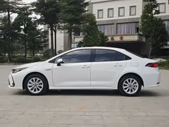 2021 Toyota Corolla Hybrid 1.8L E-CVT Elite, белый — фото 4