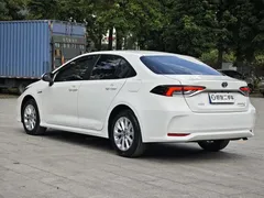 2021 Toyota Corolla Hybrid 1.8L E-CVT Elite, белый — фото 7