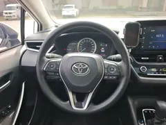 2021 Toyota Corolla Hybrid 1.8L E-CVT Elite, белый — фото 10