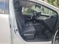 2021 Toyota Corolla Hybrid 1.8L E-CVT Elite, белый — фото 15