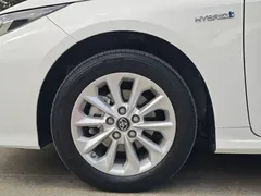 2021 Toyota Corolla Hybrid 1.8L E-CVT Elite, белый — фото 19