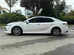 2019 Toyota Camry Hybrid 2.5HG Luxury, белый — фото 3