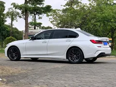 2021 BMW 3 Series 325Li M Sport Night Package, белый — фото 4