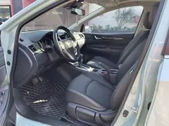 2023 Nissan Tiida 1.6L CVT, зелёный — фото 4