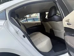 2021 Toyota Corolla 1.2T S-CVT Luxury, белый — фото 10