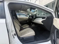 2021 Toyota Corolla 1.2T S-CVT Luxury, белый — фото 11