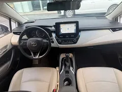 2021 Toyota Corolla 1.2T S-CVT Luxury, белый — фото 12