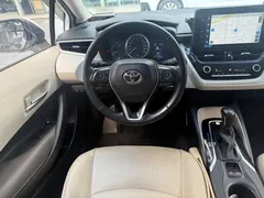 2021 Toyota Corolla 1.2T S-CVT Luxury, белый — фото 13