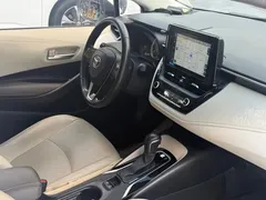 2021 Toyota Corolla 1.2T S-CVT Luxury, белый — фото 15
