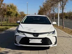 2021 Toyota Corolla TNGA 1.5L CVT Elite, белый — фото 2