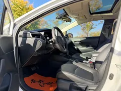 2021 Toyota Corolla TNGA 1.5L CVT Elite, белый — фото 5