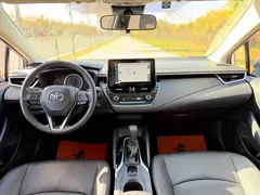 2021 Toyota Corolla TNGA 1.5L CVT Elite, белый — фото 8