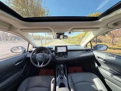 2021 Toyota Corolla TNGA 1.5L CVT Elite, белый — фото 9