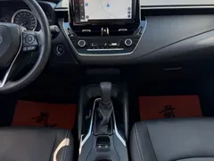 2021 Toyota Corolla TNGA 1.5L CVT Elite, белый — фото 10