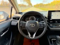 2021 Toyota Corolla TNGA 1.5L CVT Elite, белый — фото 11
