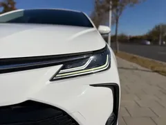 2021 Toyota Corolla TNGA 1.5L CVT Elite, белый — фото 18