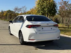 2021 Toyota Corolla TNGA 1.5L CVT Elite, белый — фото 23
