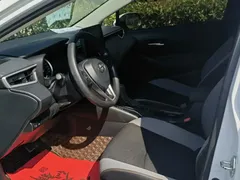2021 Toyota Corolla 1.2T S-CVT Pioneer, белый — фото 6
