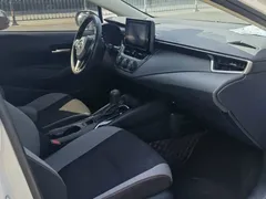 2021 Toyota Corolla 1.2T S-CVT Pioneer, белый — фото 7