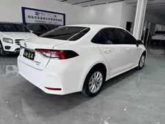 2021 Toyota Corolla 1.2T S-CVT Elite, белый — фото 4