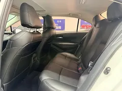 2021 Toyota Corolla 1.2T S-CVT Elite, белый — фото 9