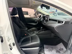 2021 Toyota Corolla 1.2T S-CVT Elite, белый — фото 12