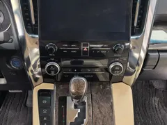 2021 Toyota Alphard Hybrid 2.5L Premium, белый — фото 14